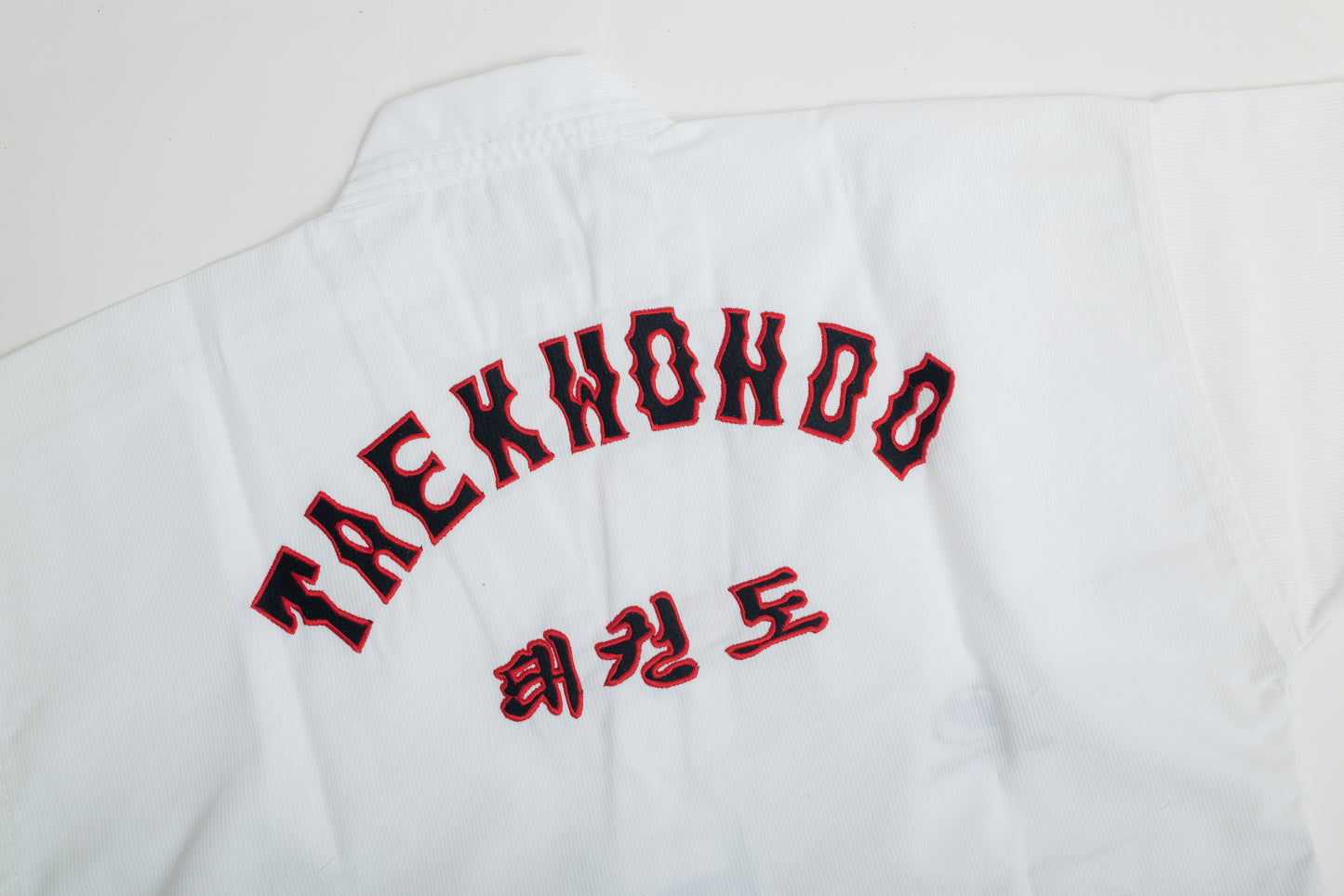Uniforme taekwondo wt bordado niños