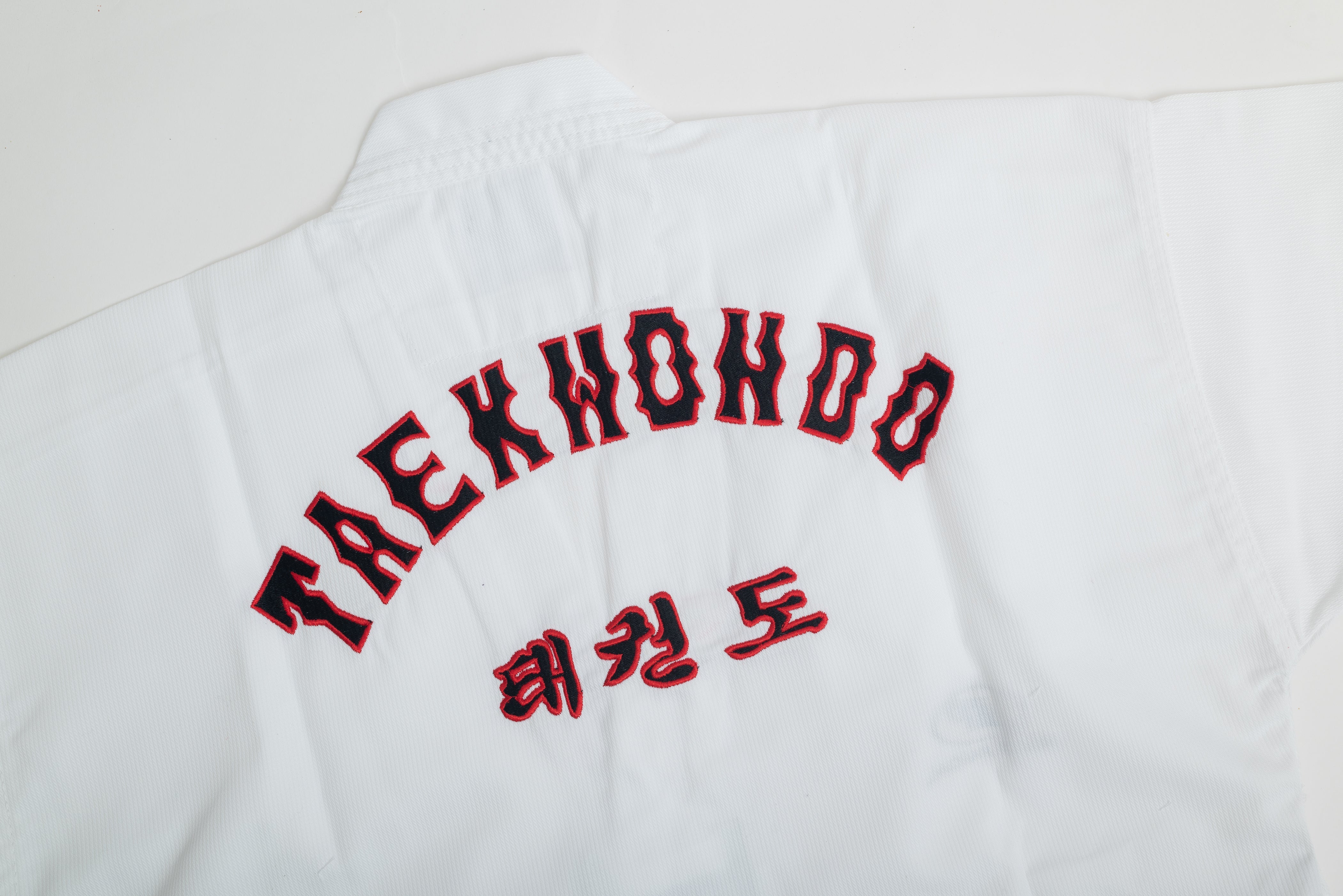 Uniforme taekwondo wt bordado adulto